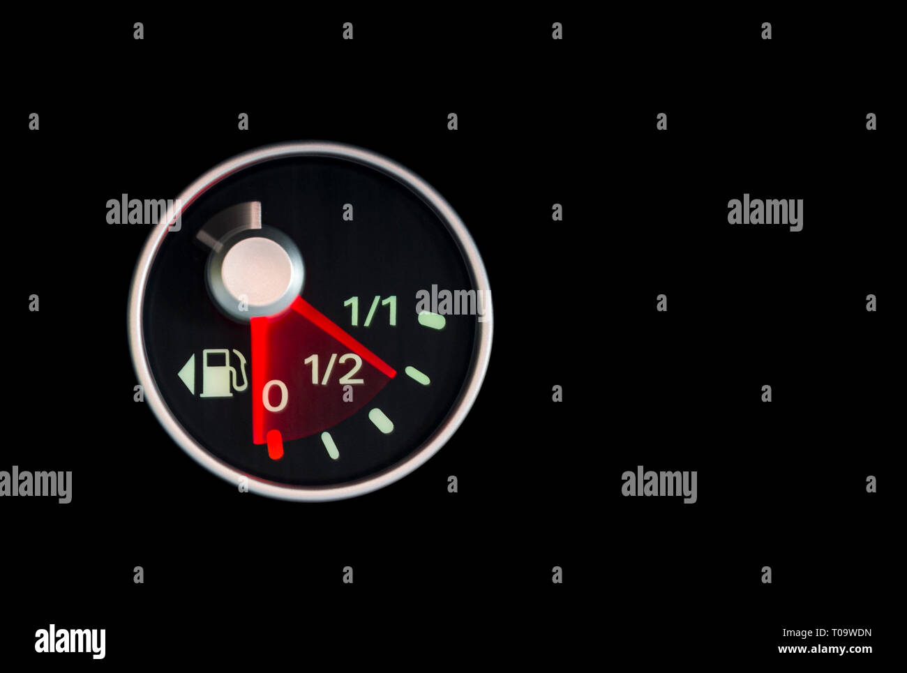 fast dropping fuel gauge on instrument panel Stock Photo Alamy