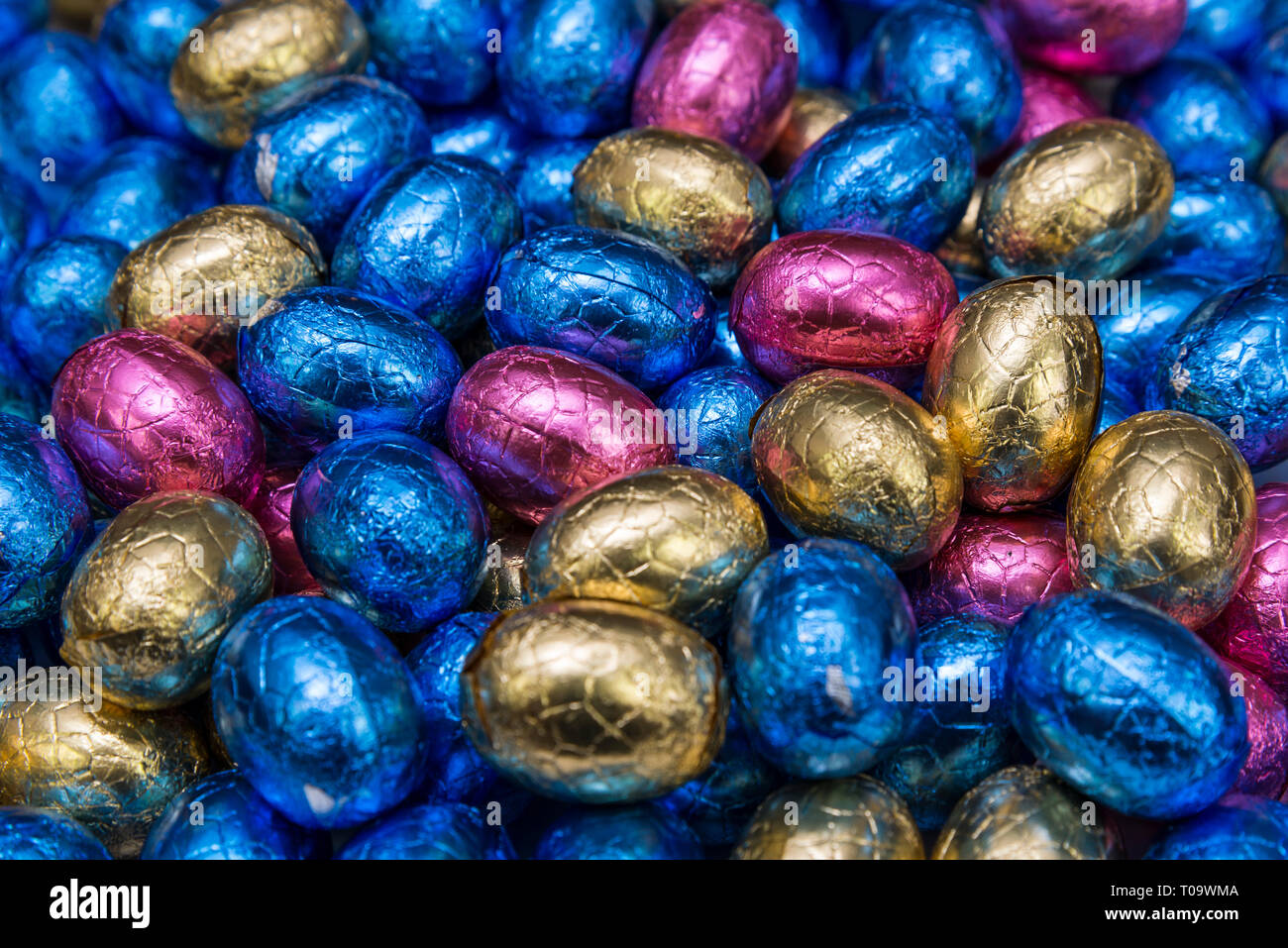 chocolate easter eggs in colorful wrappings Stock Photo Alamy