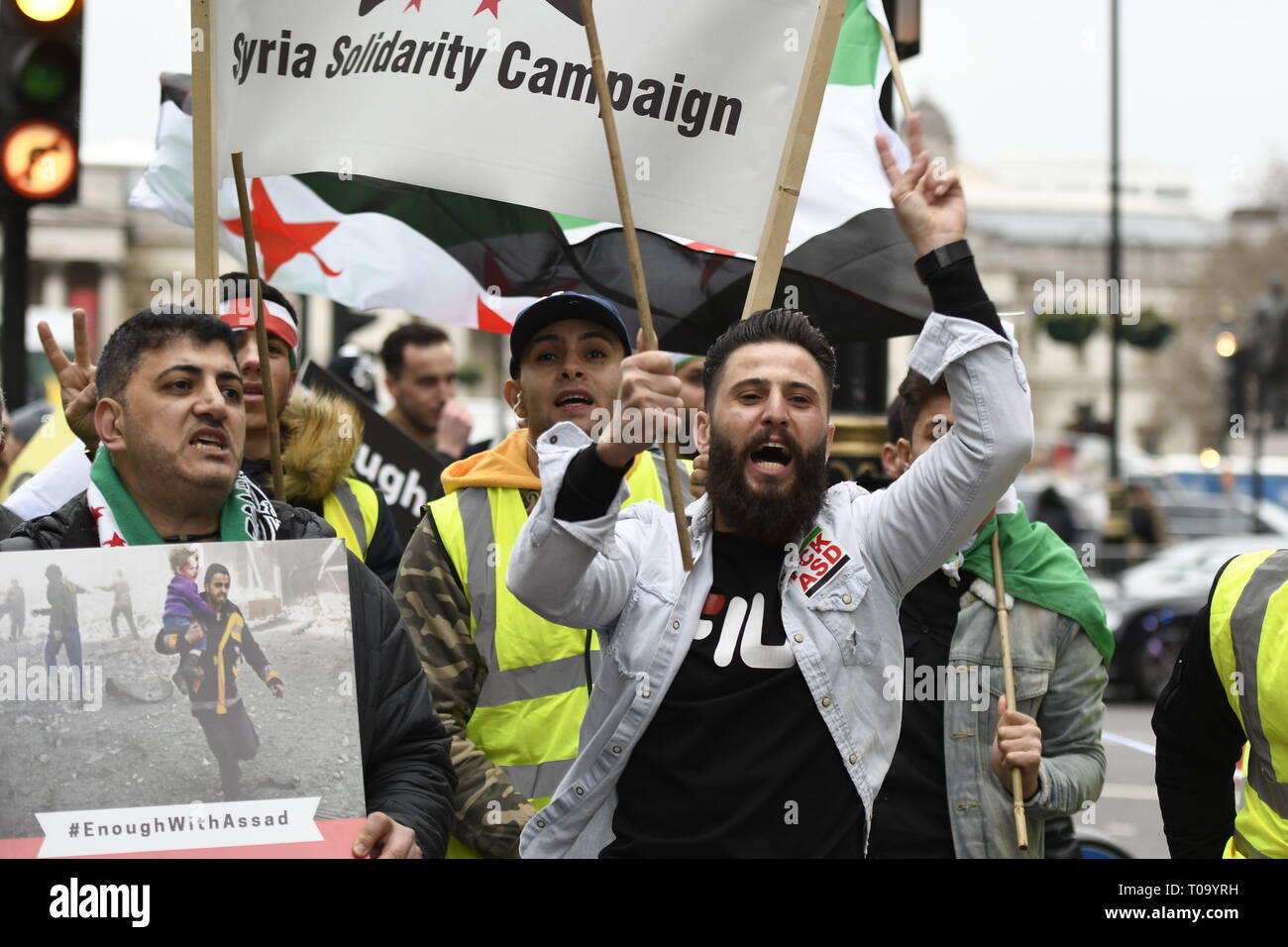 London, Greater London, UK. 16th Mar, 2019. Protesters are seen shouting slogans during the 8th Anniversary of the Syrian Revolution protest.Syrians marched from Paddington Green to Whitehall to demand for a peaceful solution of the war in Syria and restore democracy, they also call for an end of forced displacement, war crimes and foreign occupation in the country. Credit: Andres Pantoja/SOPA Images/ZUMA Wire/Alamy Live News Stock Photo