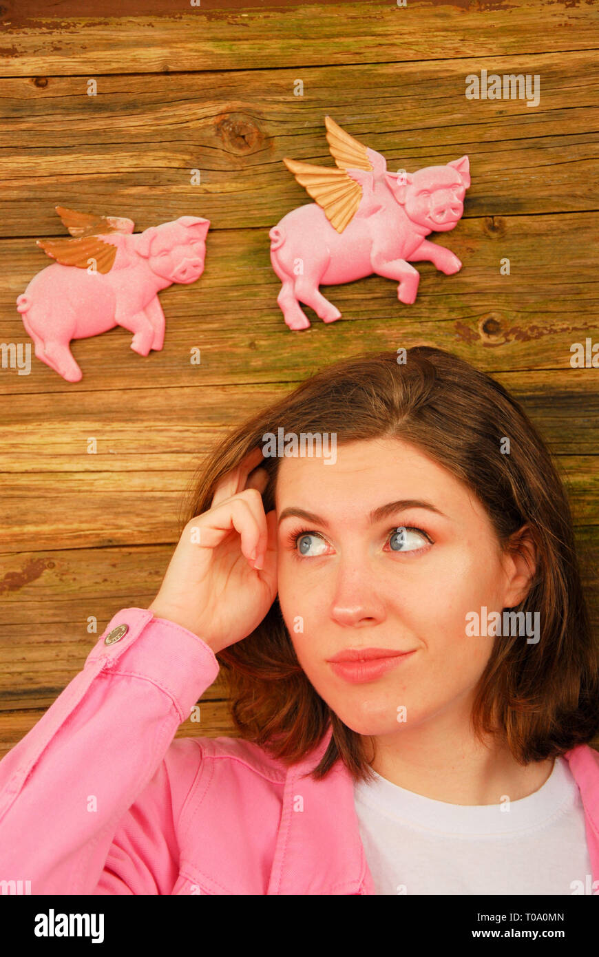 Portland, Dorset. 18th March 2019. What are the chances that Prime Minister, Boris Johnson, will get his Brexit deal over the line ?  Dorset-based set-designer, Sophie (23), is not entirely convinced that the signs are good ( MODEL RELEASED ) Stock Photo