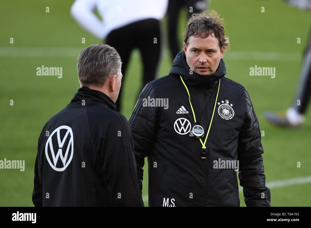 Warm-up: goalkeeping coach Andreas Koepke (Germany) and DFB assistant coach  Marcus Sorg (Germany) in the conversation. GES/Football/National Team: DFB-Training,  17.03.2019 Football/Soccer: German National Football Team, Training,  Practice, Wolfsburg ...