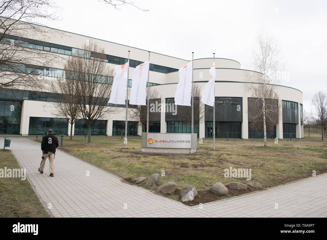 19 March 2019, Saxony, Dresden: The premises of the chip manufacturer Globalfoundries (GF).  On the same day, the Saxon Cabinet will hold an external meeting with a focus on digitisation at Globalfoundries. Photo: Sebastian Kahnert/dpa-Zentralbild/dpa Stock Photo