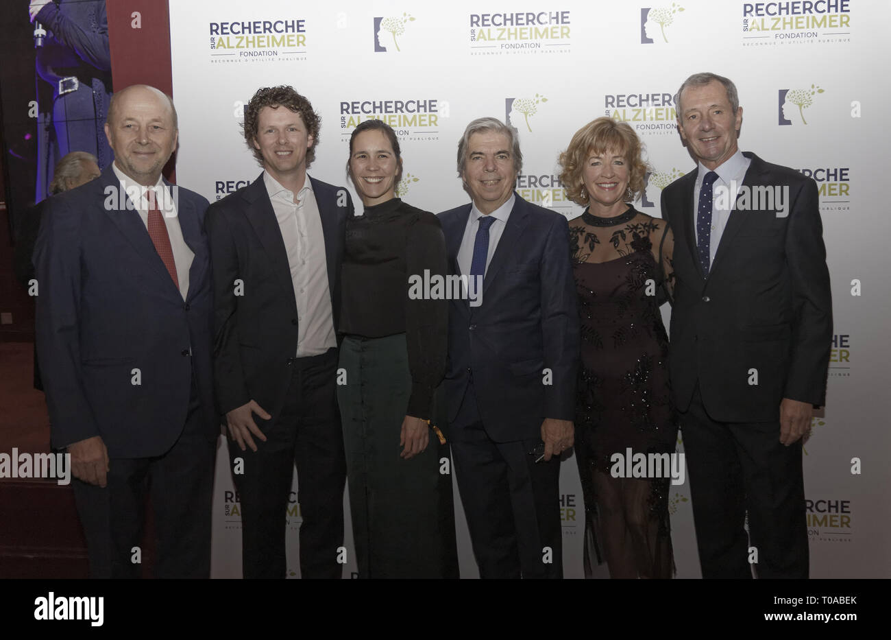 Paris, France. 18th Mar 2019. Olivier De Ladoucette (L), Dr Rik Ossenkoppele & his wife, Pr Bruno Dubois and Pr Ian McKeith & his wife - Photocall of the 14th Gala 2019 of the Association for Alzheimer Research at the Olympia in Paris on March 18, 2019, France Credit: Véronique PHITOUSSI/Alamy Live News Stock Photo