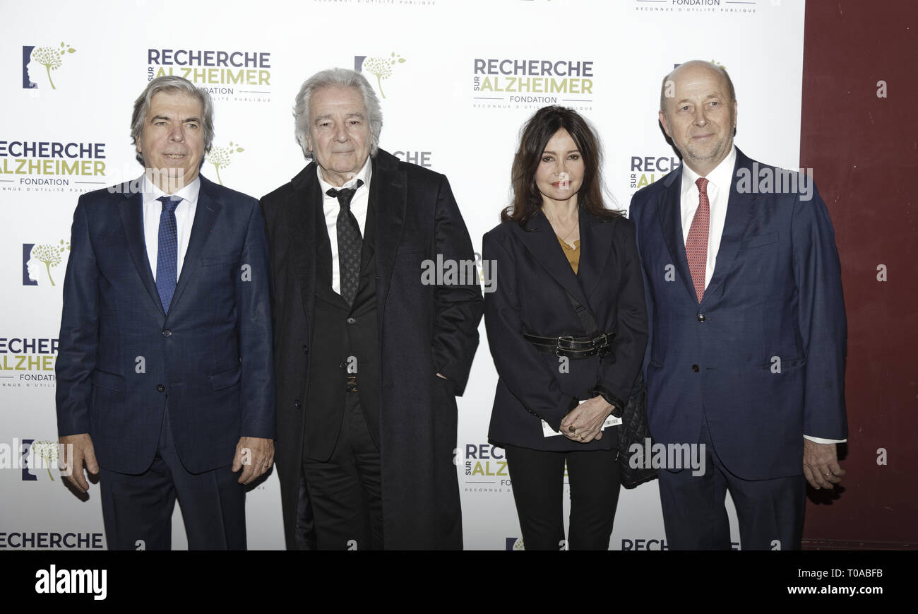 Paris, France. 18th Mar 2019. Pr Bruno Dubois (L), Pierre Arditi, Evelyne Bouix and Olivier De Ladoucette (R) attend the photocall of the 14th Gala 2019 of the Association for Alzheimer Research at the Olympia in Paris Stock Photo