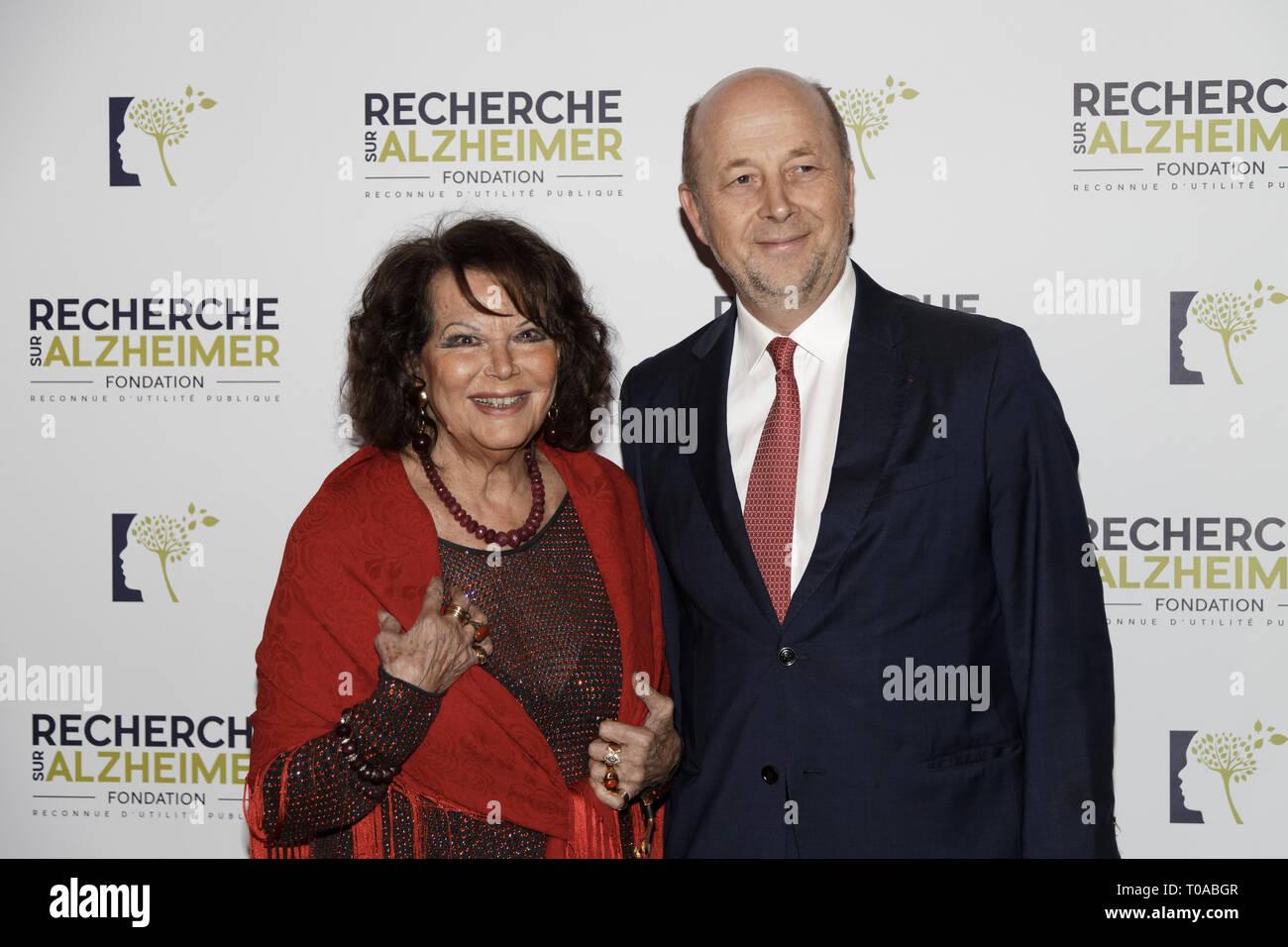 Paris, France. 18th Mar 2019. Claudia Cardinale and Olivier De Ladoucette - Photocall of the 14th Gala 2019 of the Association for Alzheimer Research at the Olympia in Paris on March 18, 2019 Credit: Véronique PHITOUSSI/Alamy Live News Stock Photo