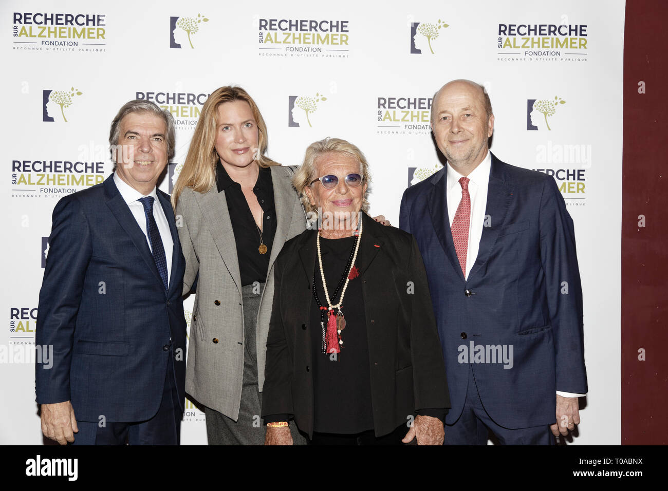 Paris, France. 18th Mar 2019. Pr Bruno Dubois(L), a guest, Veronique de Villele and Olivier De Ladoucette(R) - Photocall of the 14th Gala 2019 of the Association for Alzheimer Research at the Olympia in Paris on March 18, 2019 Credit: Véronique PHITOUSSI/Alamy Live News Stock Photo