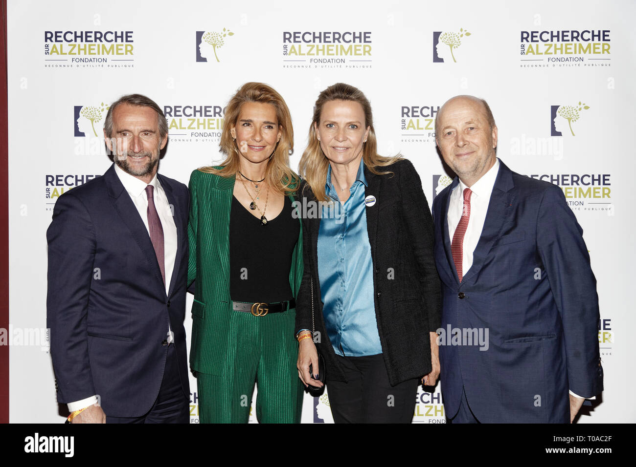 Paris, France. 18th Mar 2019. Jean-Claude Blanc, his wife Stephanie, a guest and Olivier De Ladoucette(R) - Photocall of the 14th Gala 2019 of the Association for Alzheimer Research at the Olympia in Paris on March 18, 2019 Credit: Véronique PHITOUSSI/Alamy Live News Stock Photo