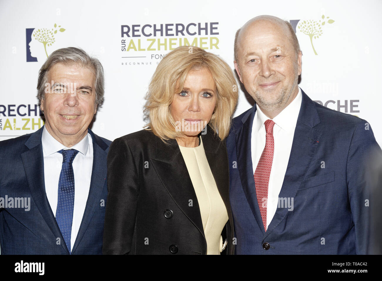 Paris, France. 18th Mar 2019. Pr Bruno Dubois, Brigitte Macron and Olivier De Ladoucette ( R) - Photocall of the 14th Gala 2019 of the Association for Alzheimer Research at the Olympia in Paris on March 18, 2019 Credit: Véronique PHITOUSSI/Alamy Live News Stock Photo