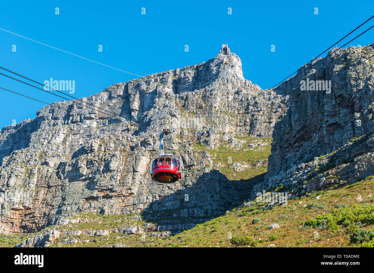 The famous cable car leading to Table mountain national park bringing tourists up the mountain for hikes and viewpoints, Cape Town, South Africa. Stock Photo