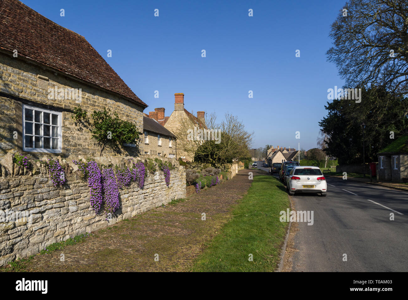 High Street, on a sunny Winter's day, in the pretty village of  Weston Underwood, Buckinghamshire, UK Stock Photo