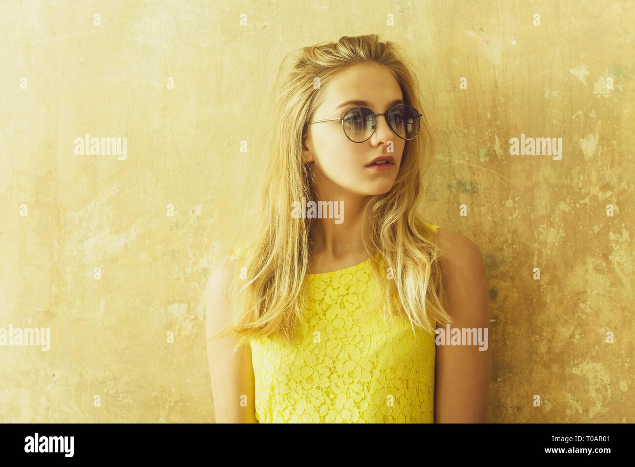 Pretty Girl With Long Blonde Hair In Yellow Dress Sunglasses