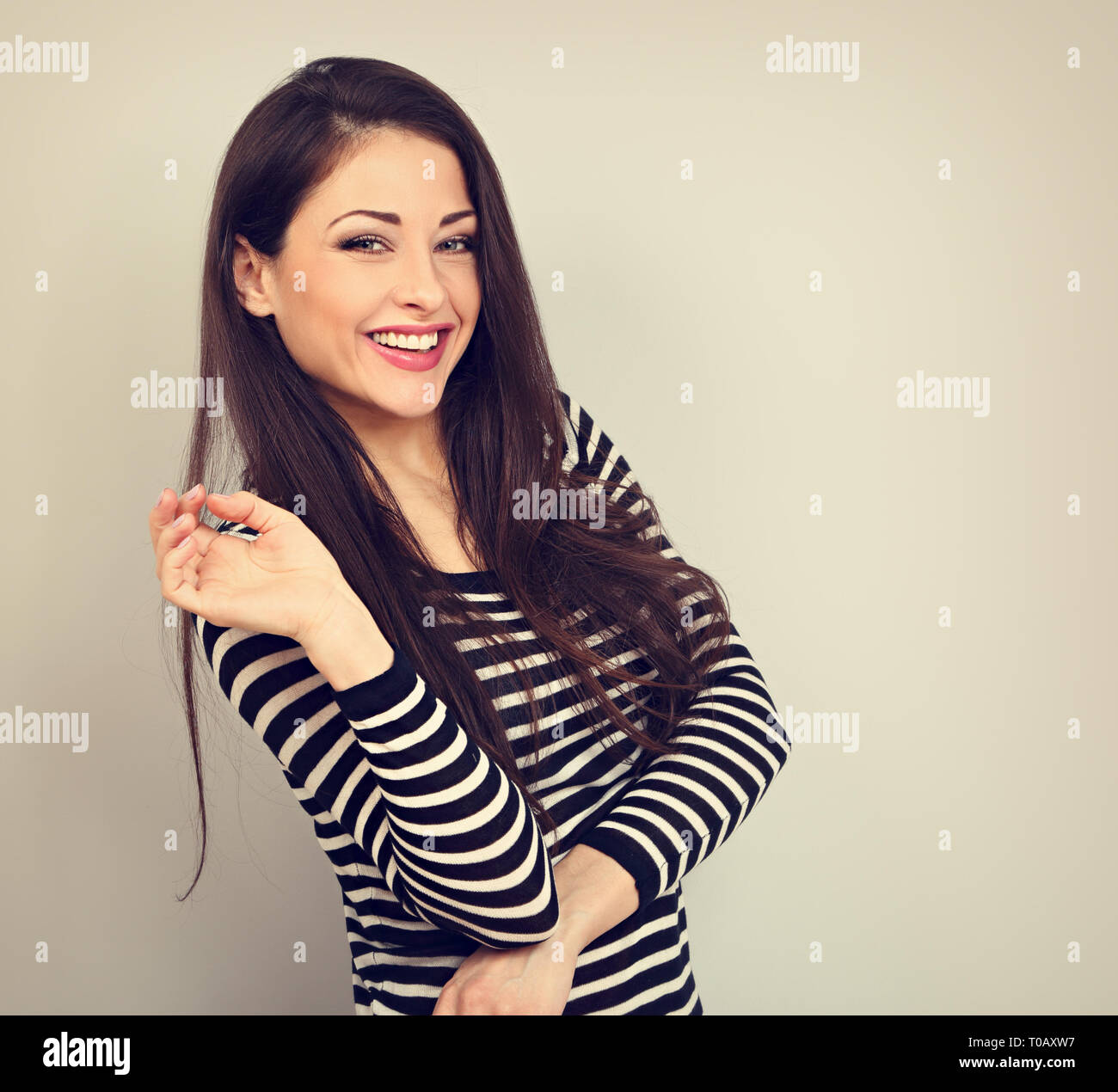 Beautiful Young Laughing Casual Woman With Wide Toothy Smile On