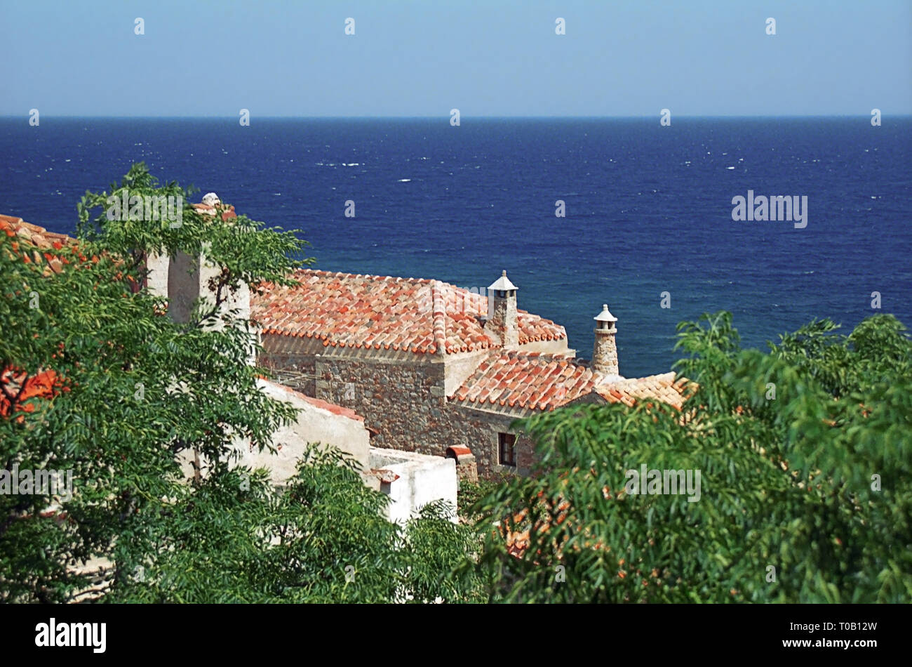 Tiled rooftops in the Lower Town overlooking the sea, Monemvassia, Laconia, Greece Stock Photo