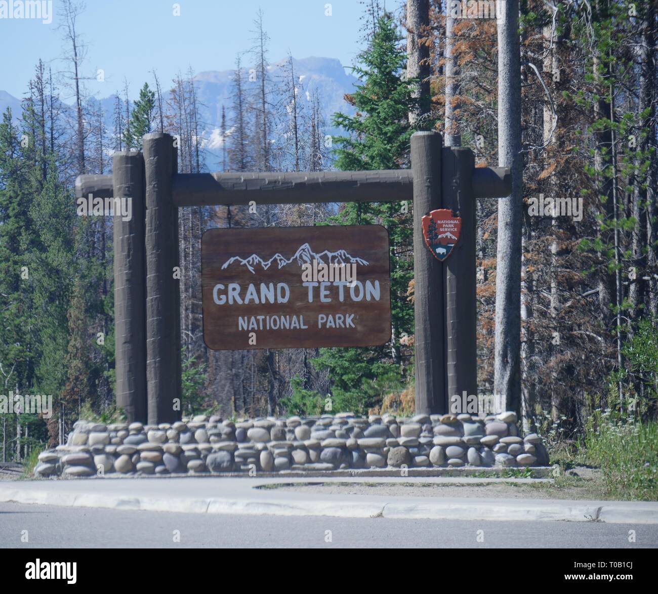 Close up of the Grand Teton National Park sign on the boundary of Yellowstone National Park. Stock Photo