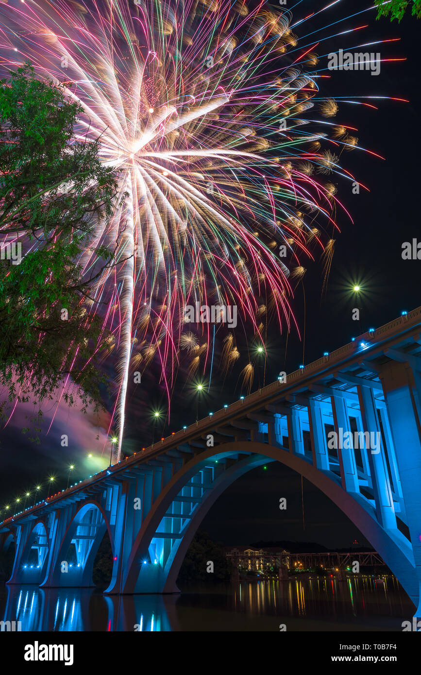 A Single Firework Bursts Above Henley Street Bridge In Knoxville Tn During The Fourth Of July Firework Display And Celebration Stock Photo Alamy