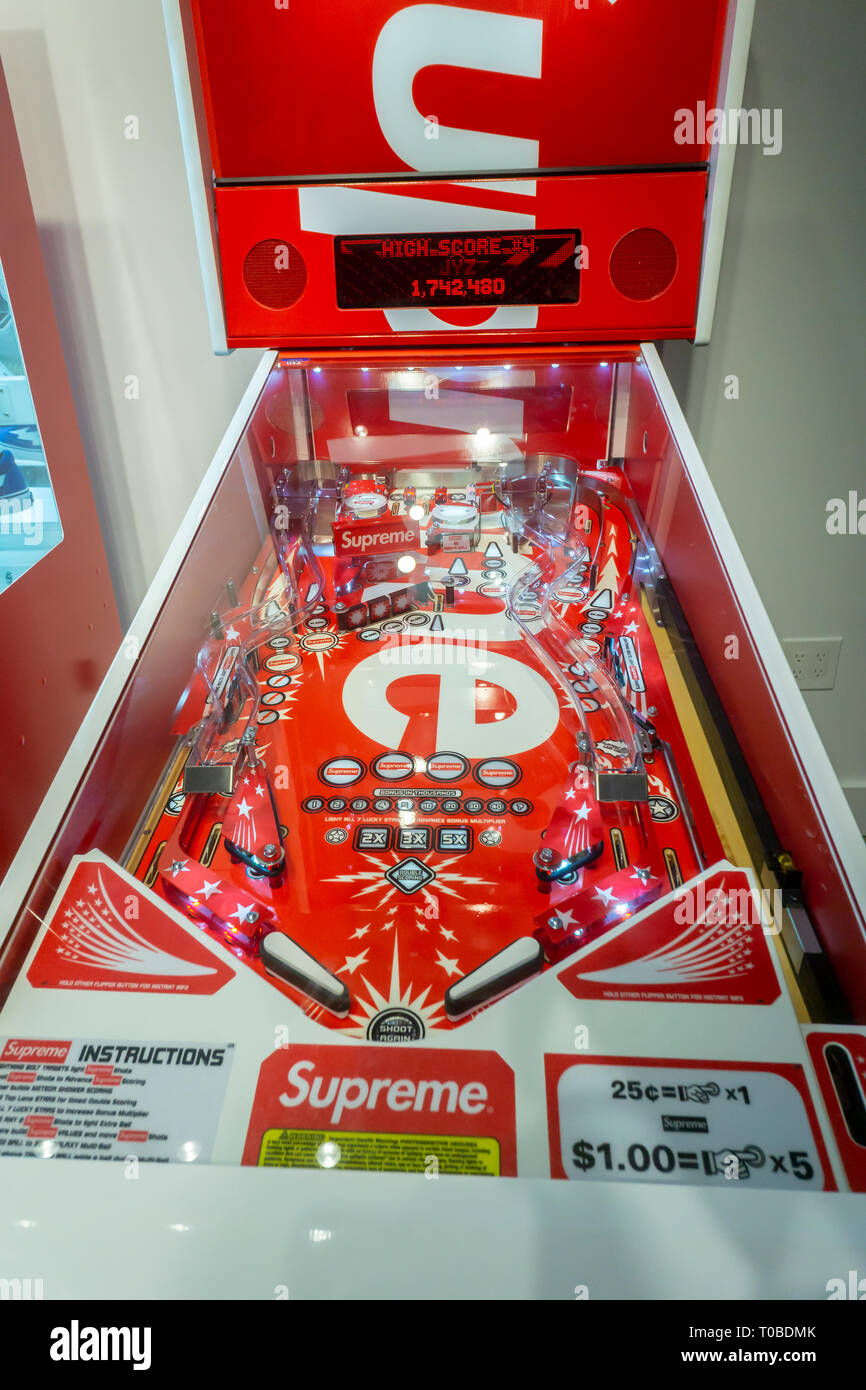 A Supreme branded pinball machine in the American Eagle store's Urban  Necessities pop-up in the Soho neighborhood of New York on its grand  opening day, Saturday, March 9, 2019. The pop-up features