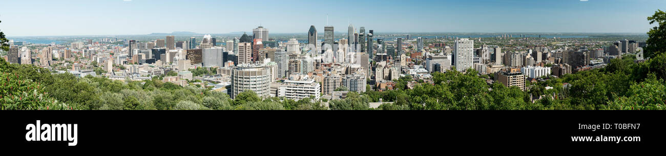 Montreal, Quebec, Canada.  Panoramic view of downtown looking southeast from Mount Royal Chalet lookout in Mount Royal Park in summer. Stock Photo
