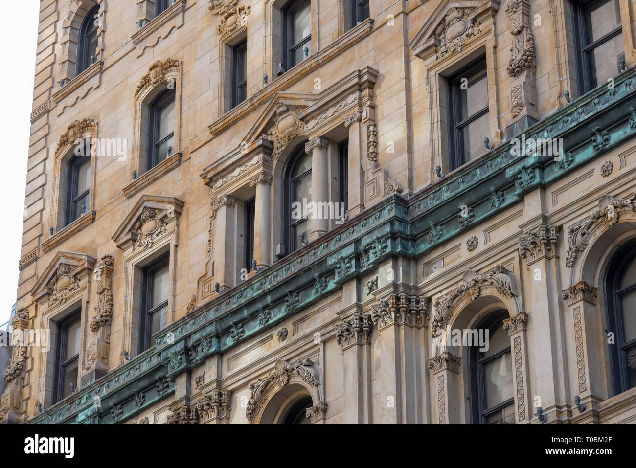 Montreal, Quebec, Canada.  Details of portion of historic St. James Hotel, viewed from intersection of Saint Pierre and Saint Jacques Streets. Stock Photo