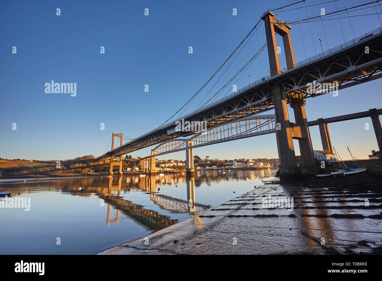 A dusk view of the Tamar Bridges, across the Hamoaze, estuary of the River Tamar, linking Plymouth in Devon and Saltash in Cornwall, Great Britain. Stock Photo