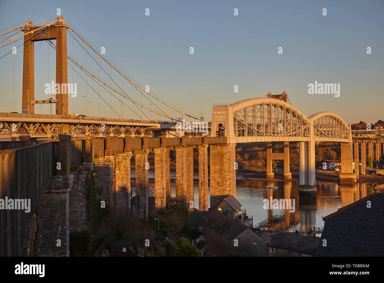 A dusk view of the Tamar Bridges, across the Hamoaze, estuary of the River Tamar, linking Plymouth in Devon and Saltash in Cornwall, Great Britain. Stock Photo