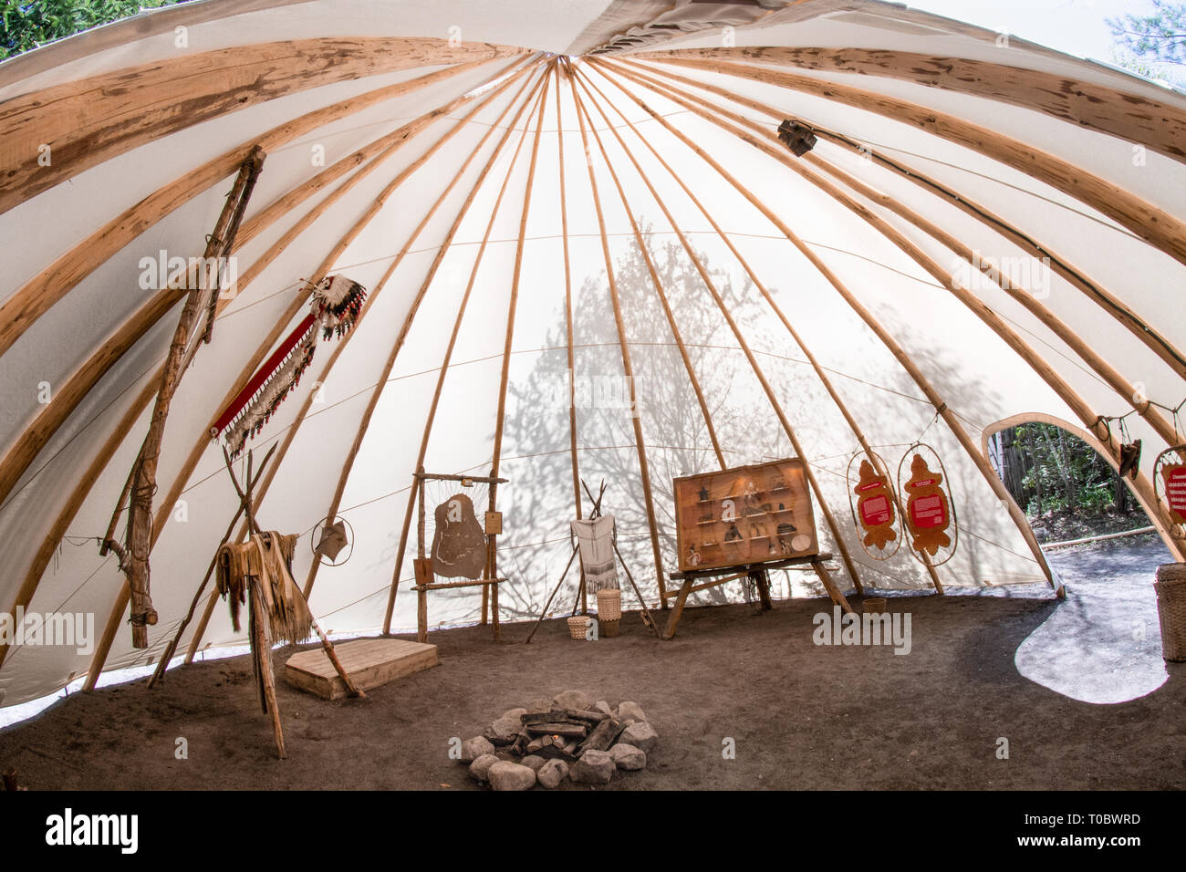 Inside a wigwam with some belongings Stock Photo
