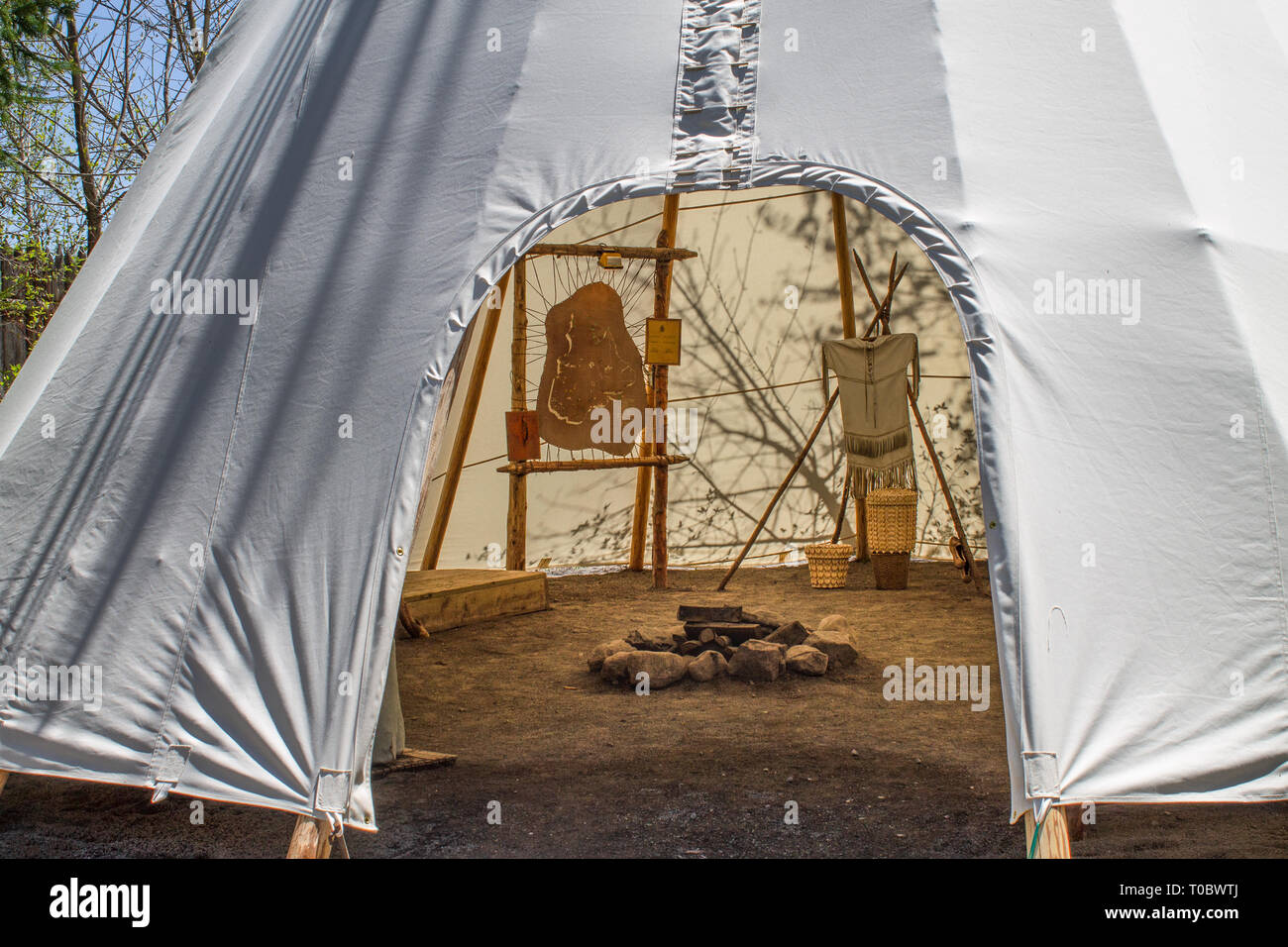 Inside a wigwam with some belongings Stock Photo