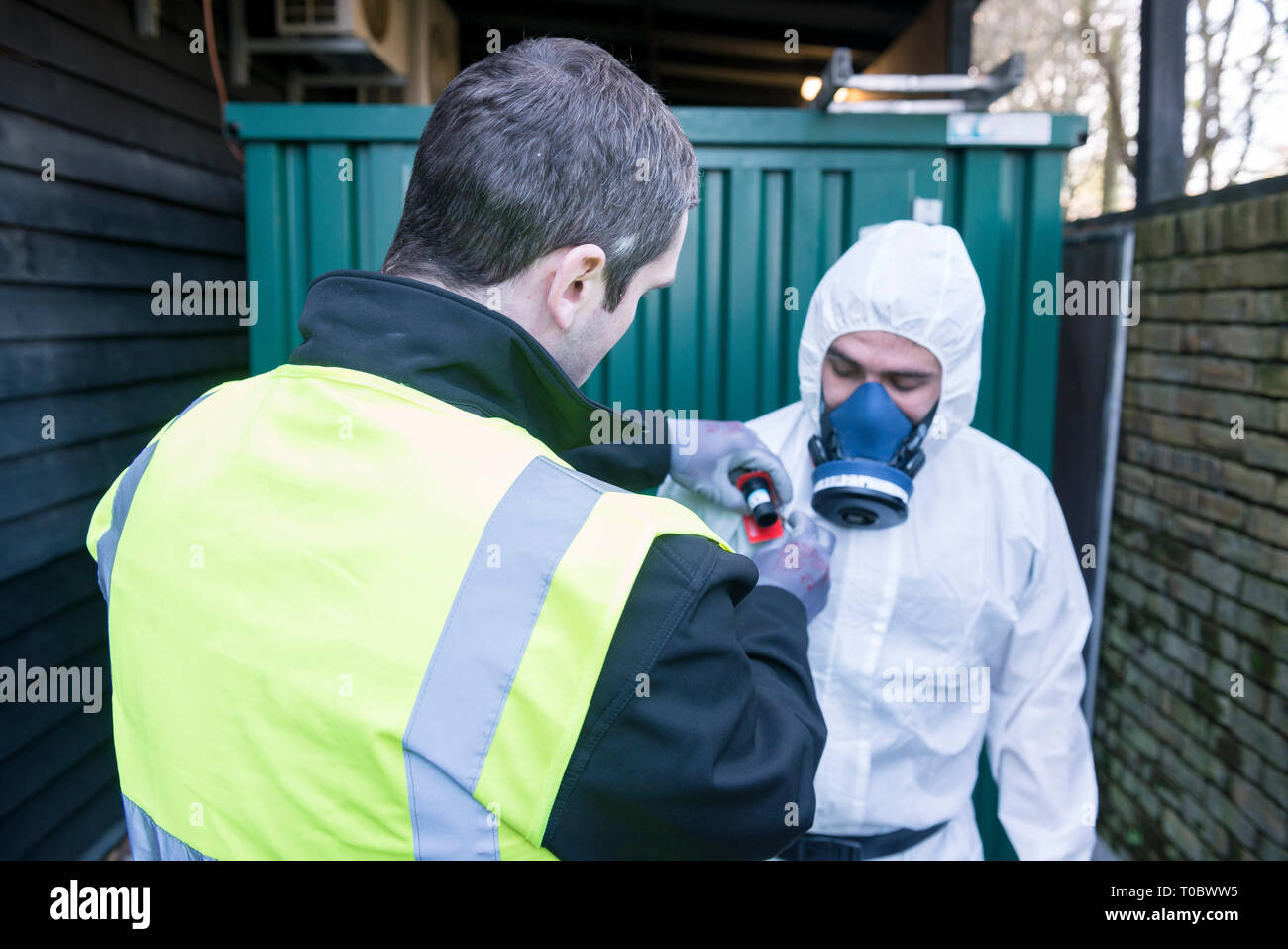 Hazard suit workers hires stock photography and images Alamy