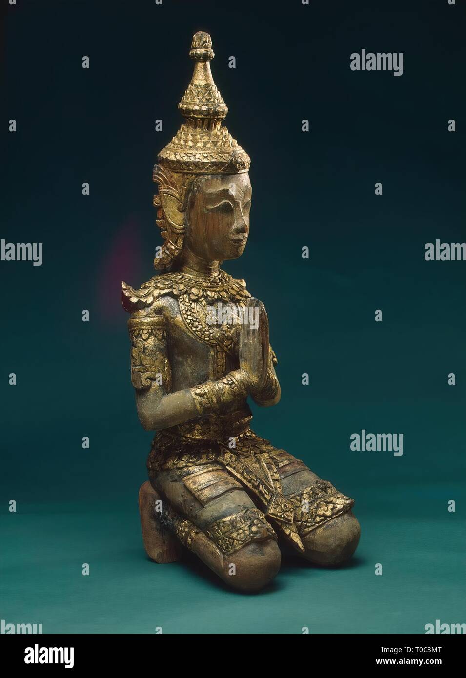 'Kneeling Adorer'. Siam (now Thailand). Bangkok art, Late 18th - early 19th century. Dimensions: h. 50,5 cm. Museum: State Hermitage, St. Petersburg. Stock Photo