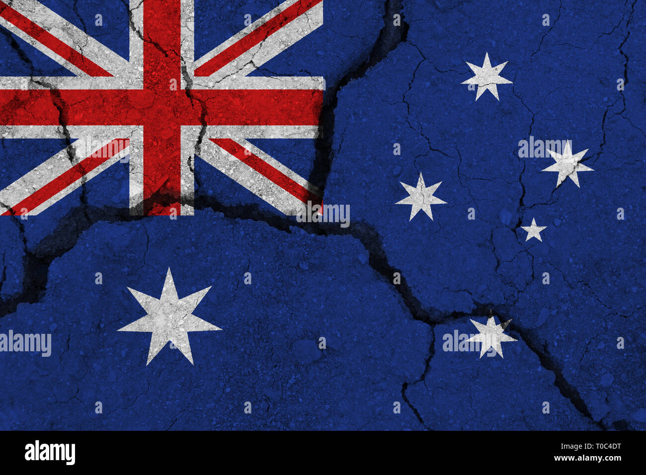Australia flag on the cracked earth. National flag of Australia