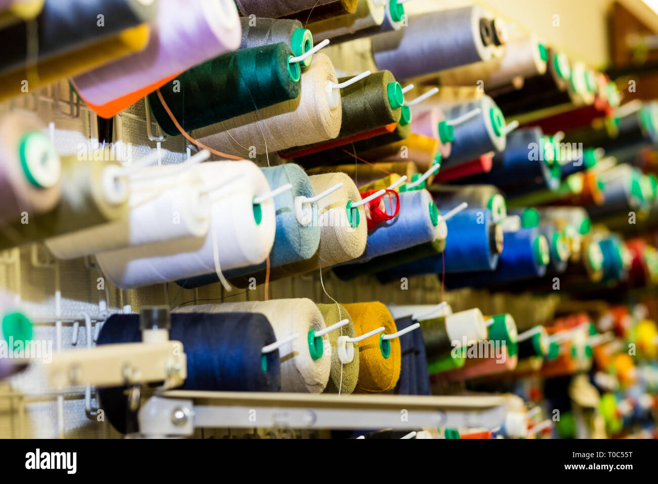 Close Up Of Colorful Sewing Threads In Drawer. Closeup Shot Of ...