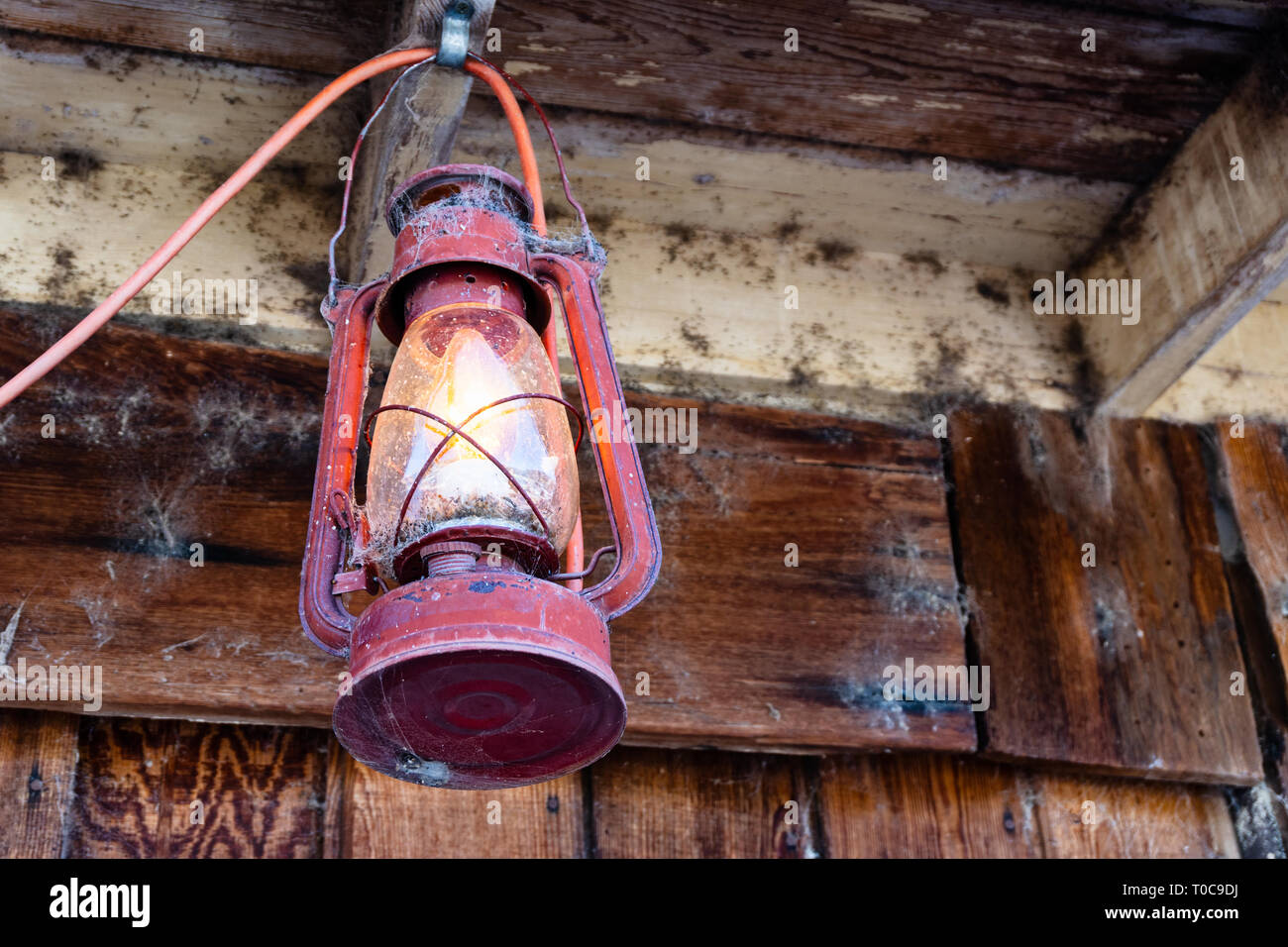 Rustic, old mining lantern hanging along a walkway in Tortilla Flat, Arizona, USA Stock Photo