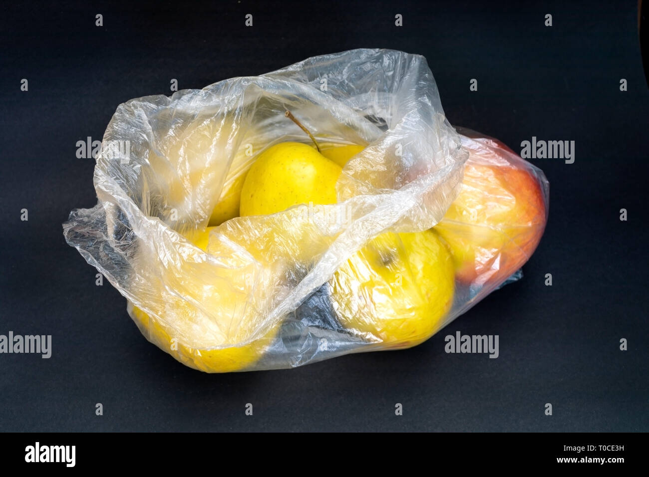 Download Close Up Yellow Apples In Plastic Bag On Grey Background Stock Photo 241219653 Alamy Yellowimages Mockups
