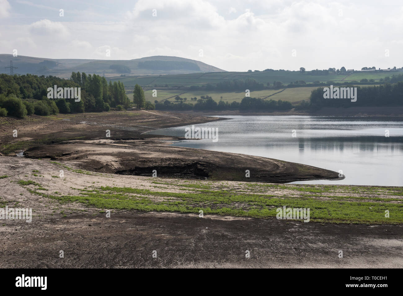 Low water levels in the drought of 2018 at Bottom's reservoir, Longdendale, Derbyshire, England. Stock Photo