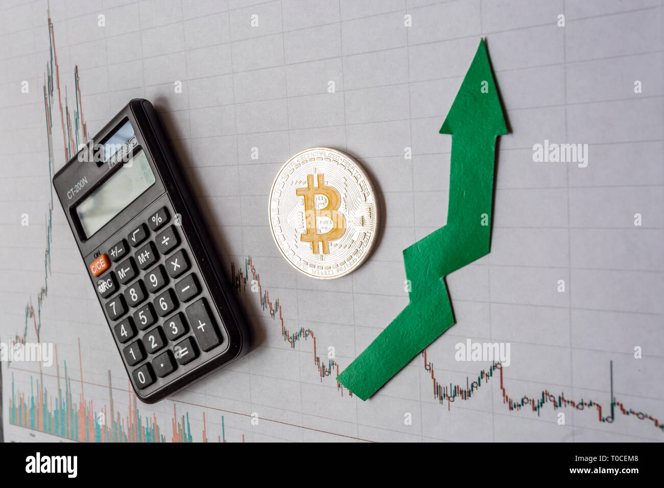 appreciation of virtual money bitcoin. Green arrow and silver Bitcoin on  paper forex chart index rating go up exchange market background . Concept  of Stock Photo - Alamy