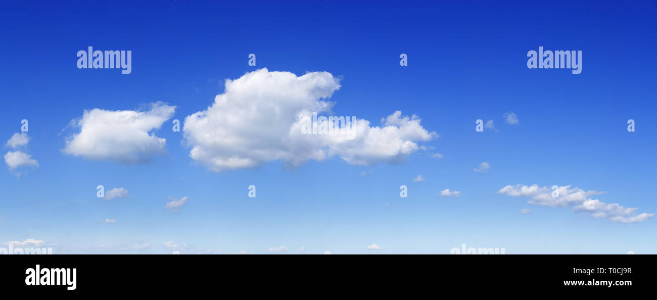 Cloudscape panorama - Blue sky and white clouds Stock Photo - Alamy
