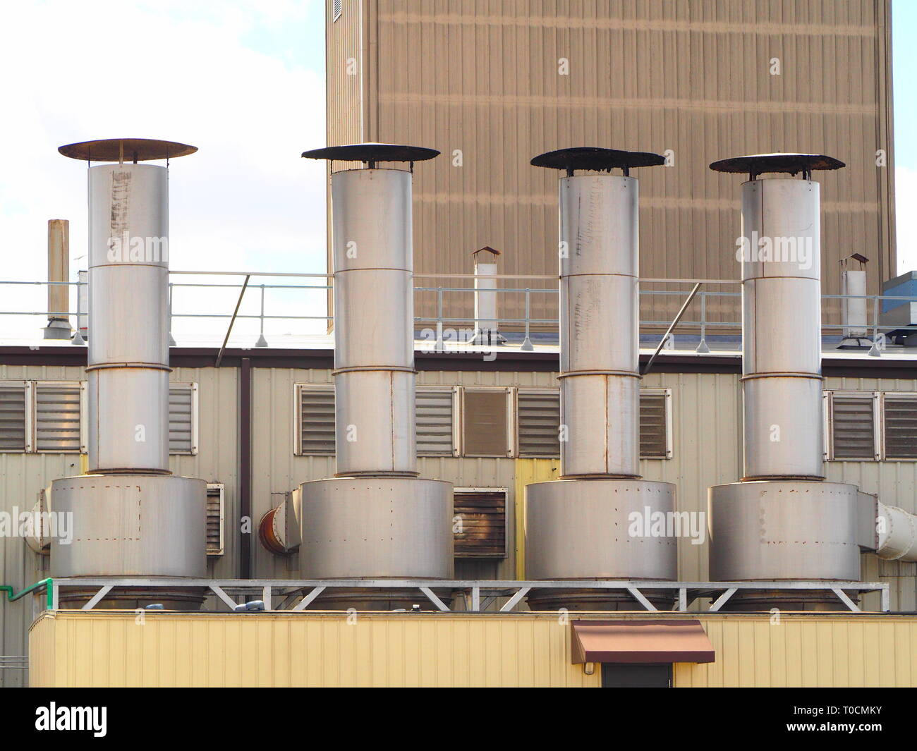 Silver roof top ventilation ducts Stock Photo Alamy