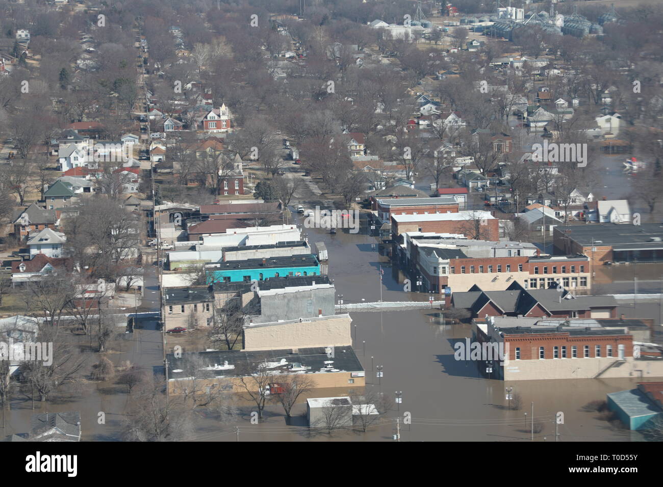 The majority of Hamburg, Iowa is covered in flood waters after an unprecedented unregulated water flow from the Platte and Elkhorn Rivers.  Water levels raised until many of the local levees were overtopped or breached. Stock Photo