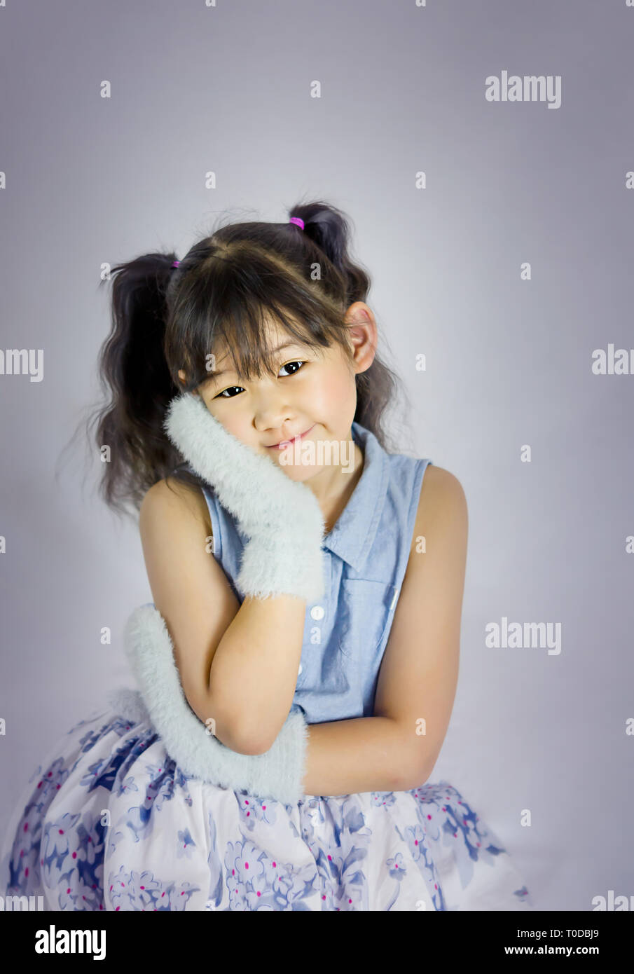 portrait of asian little girl in blue and white dress Stock Photo - Alamy