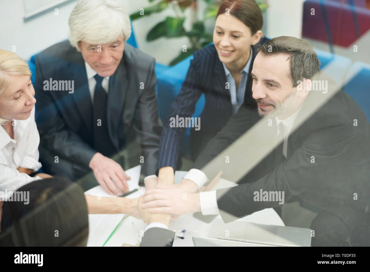 Business Team Huddling Stock Photo