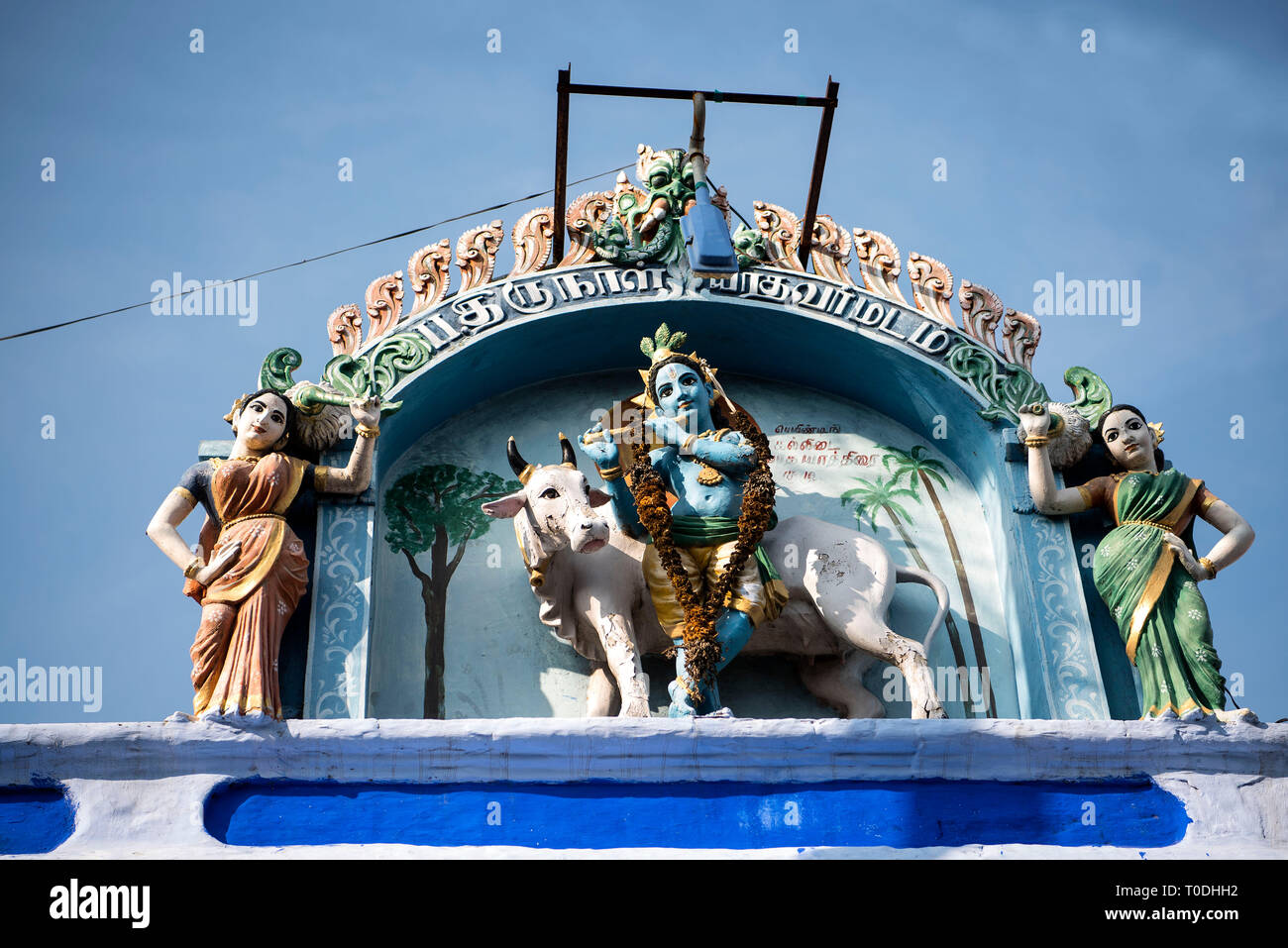 Lord Krishna statue on temple top, Thiruchendur, Tamil Nadu, India, Asia Stock Photo