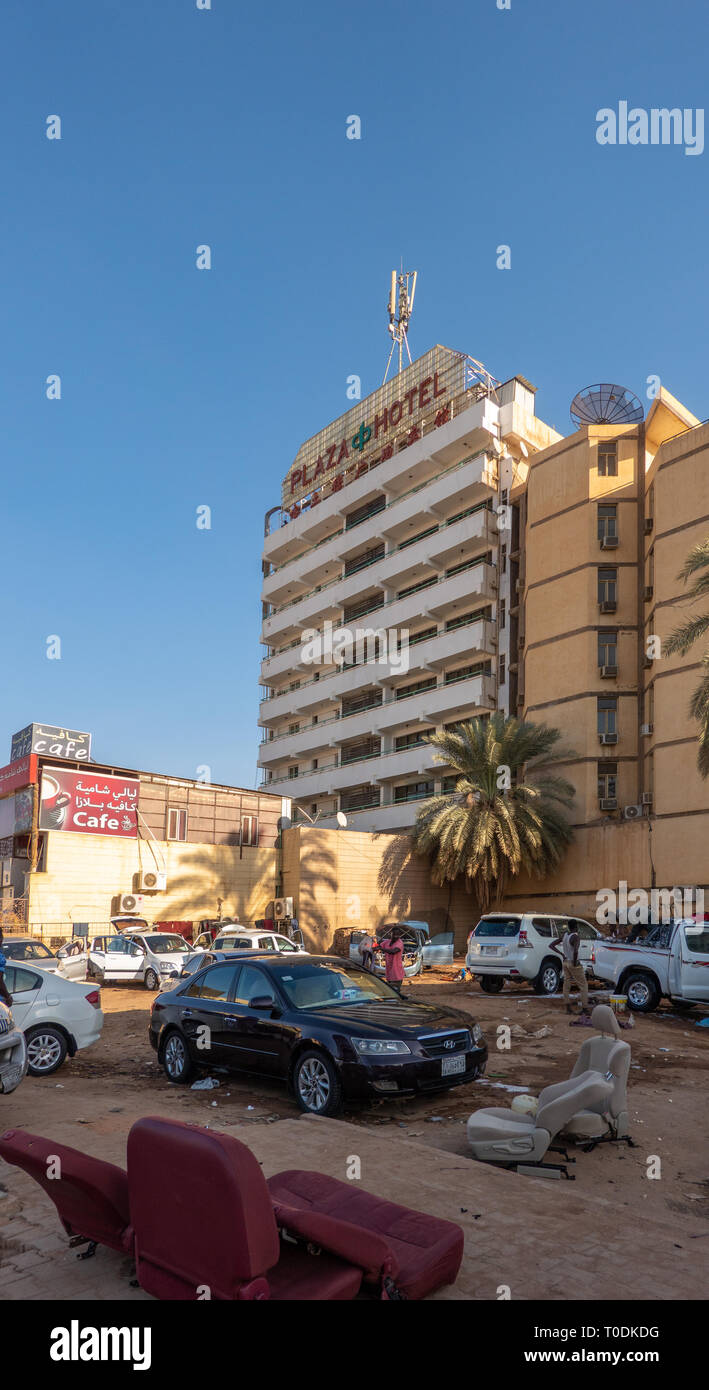 Khartoum Sudan February 5 19 Street In The Center Of Khartoum With The Chinese Plaza Hotel In The Background And An Open Garage In The Foregrou Stock Photo Alamy