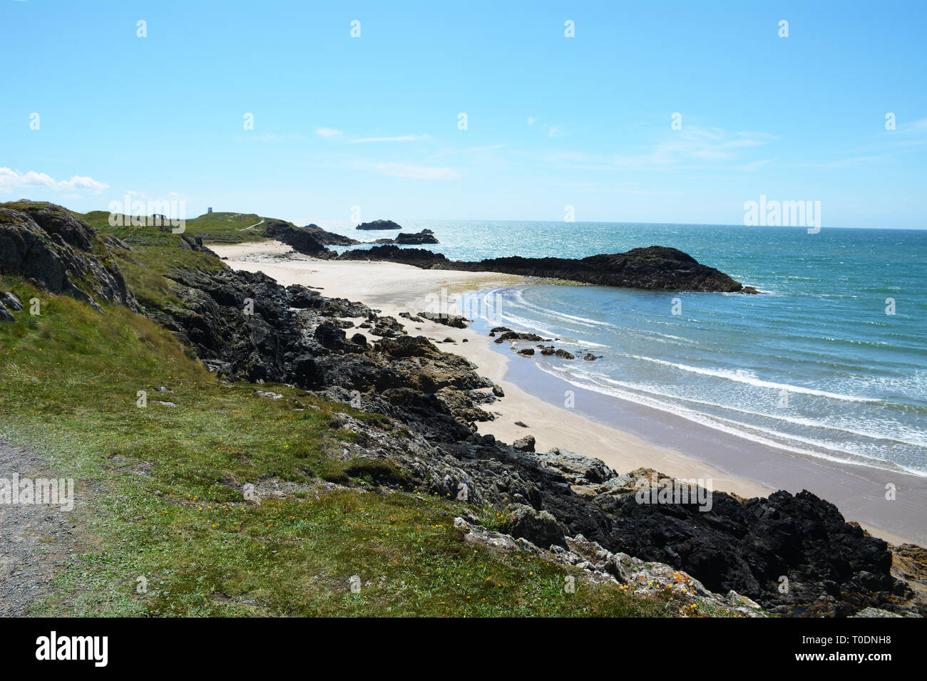 One of the many beautiful beaches on Llanddwyn Island off the coast of Anglesey Stock Photo
