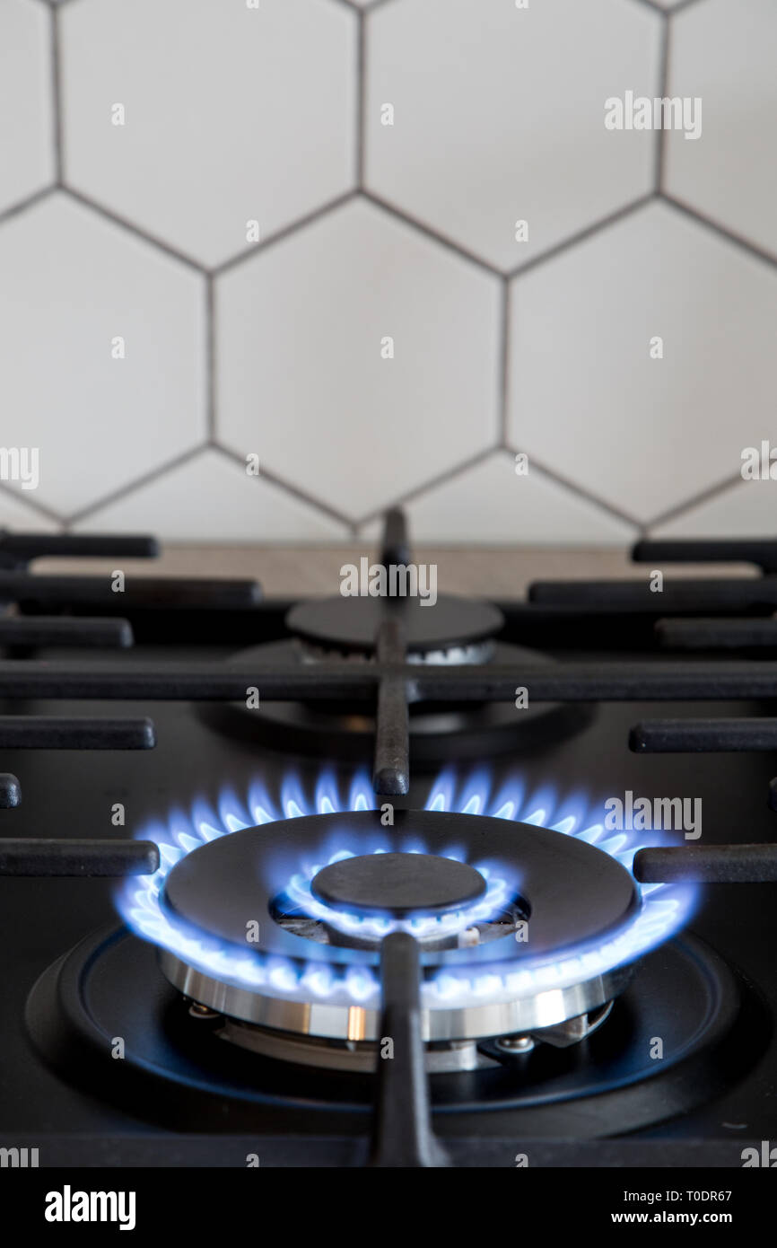 Gas burner on black modern kitchen stove. kitchen gas cooker with