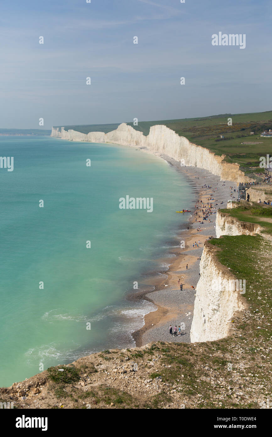 Birling gap beach and Seven Sisters white cliffs East Sussex England UK beautiful British coastline with turquoise sea Stock Photo