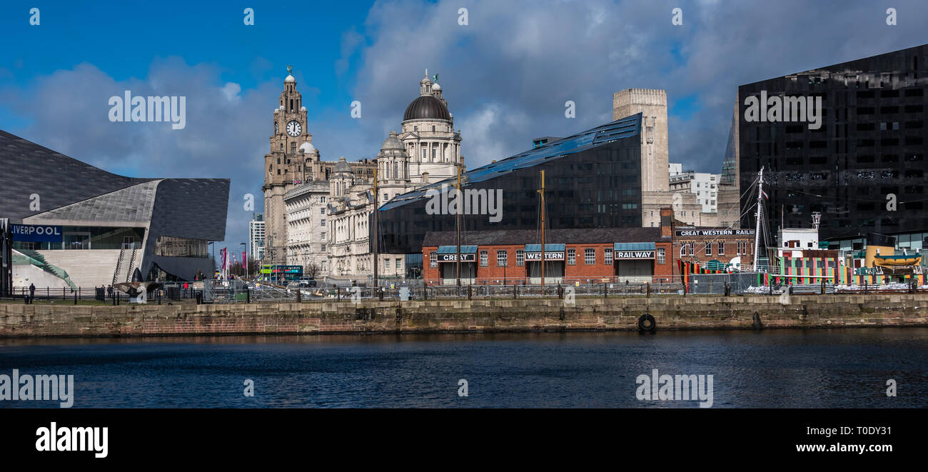 Looking over to the buildings on the historic waterfront in Liverpool from the Royal Albert Docks Stock Photo