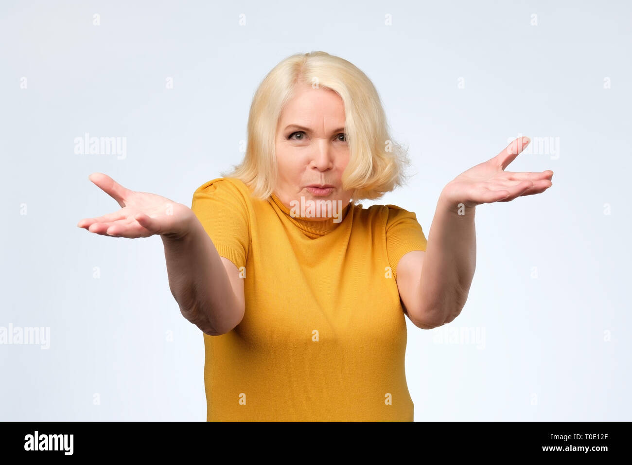 Older woman upset angry hi-res stock photography and images - Alamy