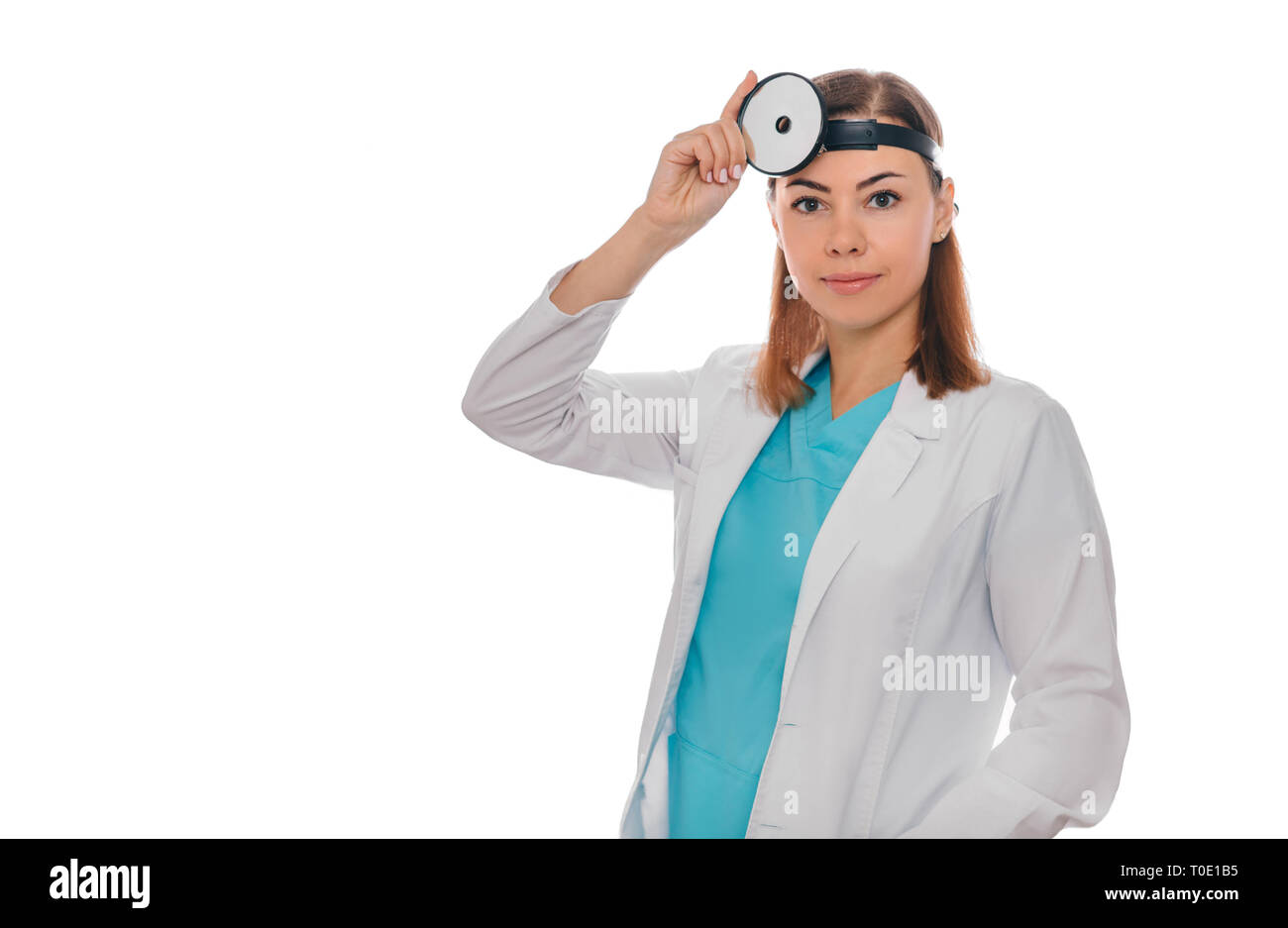 Portrait smiling ENT doctor with medical mirror on head isolated on white Stock Photo
