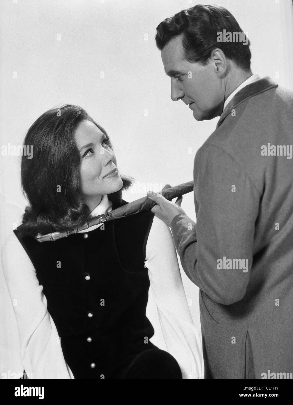 Patrick Macnee as John Steed Diana Rigg as Emma Peel THE AVENGERS 1965 ABC Weekend Television / Associated British Corporation Stock Photo