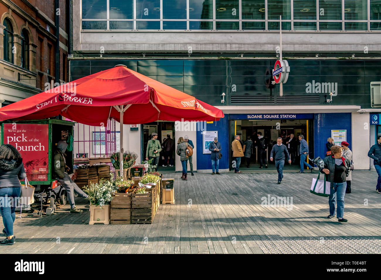A flower stall outside Sloane Square Underground Station on The District and Circle Line of the London Underground, London, UK Stock Photo