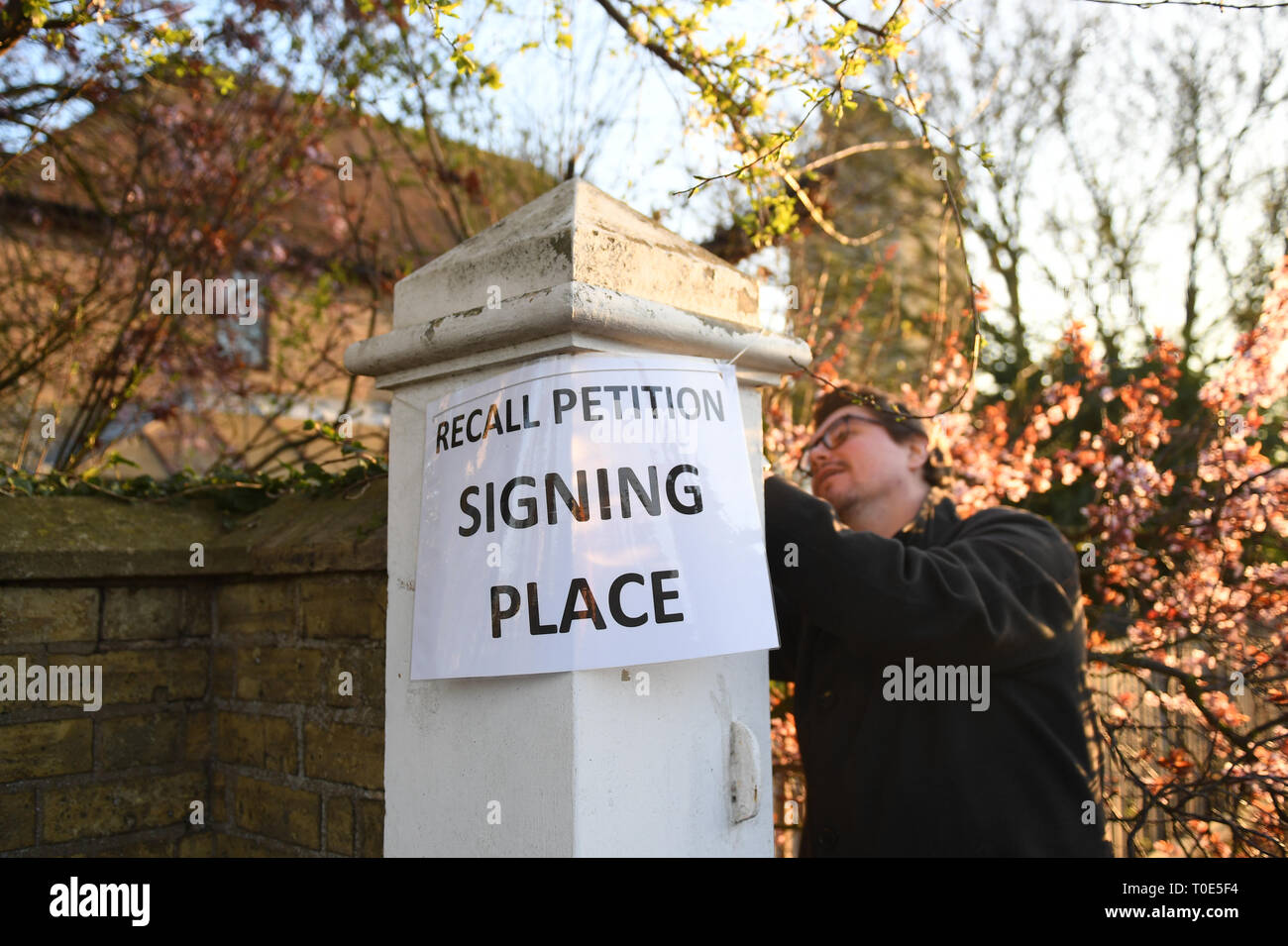 A sign is placed outside Bedford Hall in Thorney, Peterborough, where voters are being given the opportunity to sign a petition to force a by-election following the conviction of local MP Fiona Onasanya for lying about a speeding offence. Stock Photo